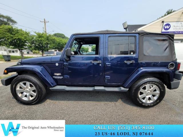Photo of 2013 True Blue Pearlcoat Jeep Wrangler Unlimited