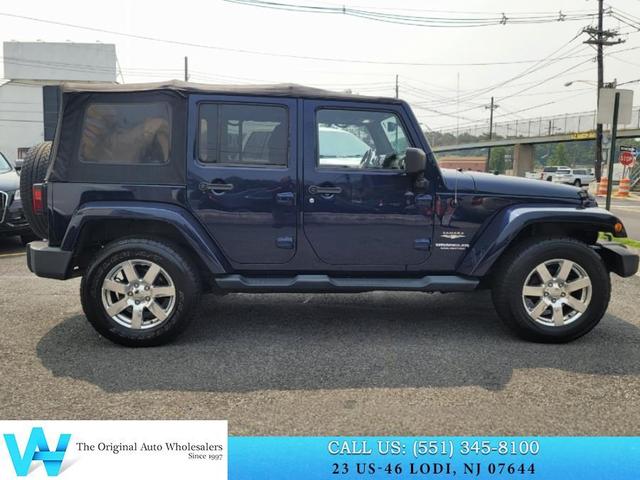 Photo of 2013 True Blue Pearlcoat Jeep Wrangler Unlimited