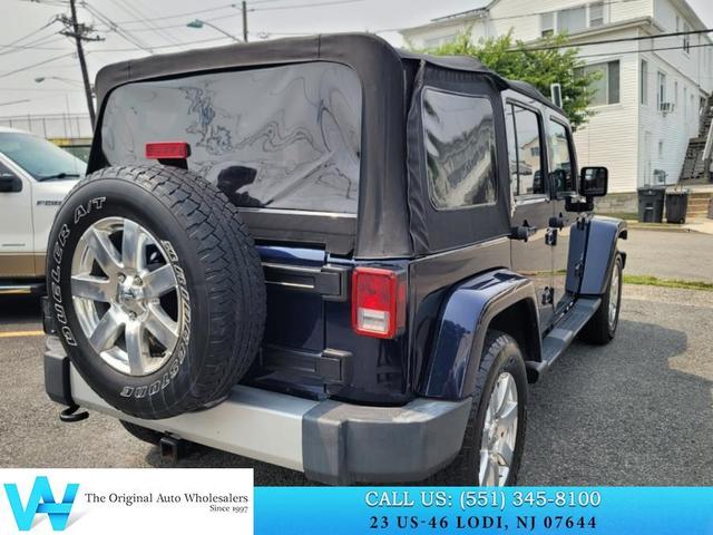Photo of 2013 True Blue Pearlcoat Jeep Wrangler Unlimited