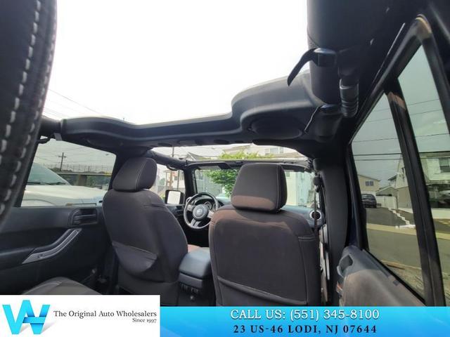 Photo of 2013 True Blue Pearlcoat Jeep Wrangler Unlimited