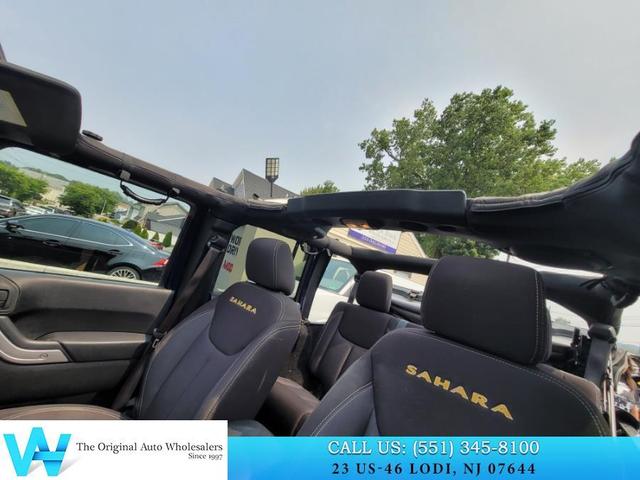 Photo of 2013 True Blue Pearlcoat Jeep Wrangler Unlimited