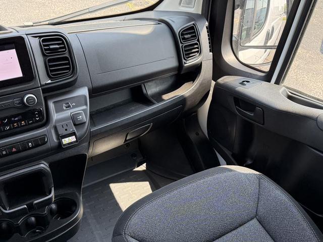 Photo of 2025 Bright White Clearcoat RAM ProMaster 2500