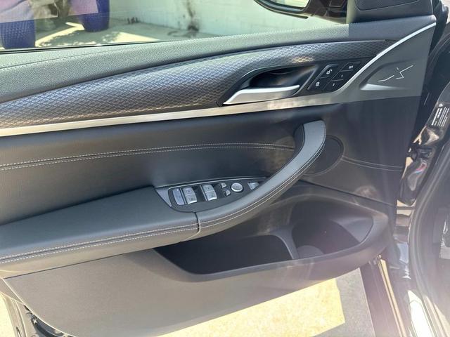 Photo of 2024 Black Sapphire Metallic BMW X4