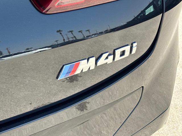 Photo of 2024 Black Sapphire Metallic BMW X4