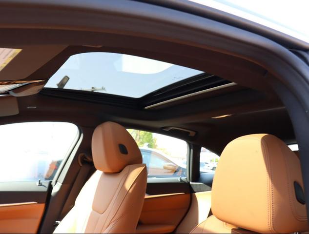 Photo of 2025 Skyscraper Grey Metallic BMW i4 Gran Coupe