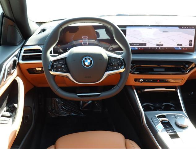 Photo of 2025 Skyscraper Grey Metallic BMW i4 Gran Coupe