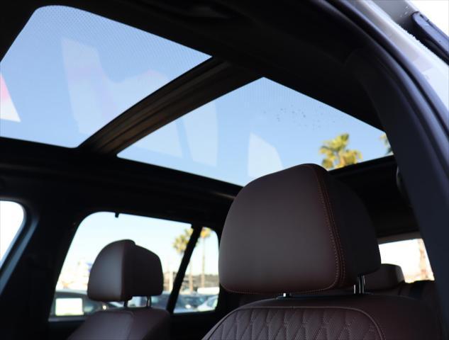 Photo of 2024 Mineral White Metallic BMW X5 PHEV