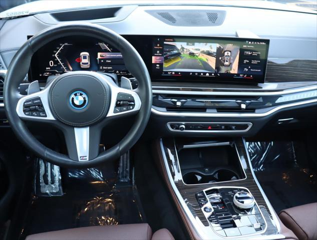 Photo of 2024 Mineral White Metallic BMW X5 PHEV