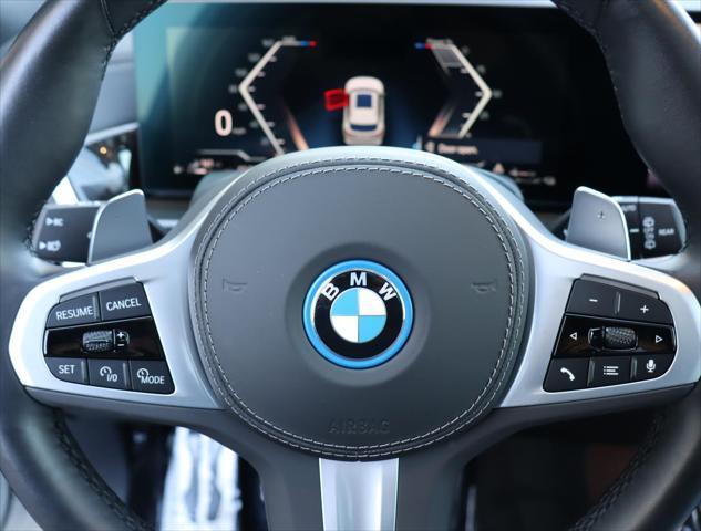 Photo of 2024 Mineral White Metallic BMW X5 PHEV