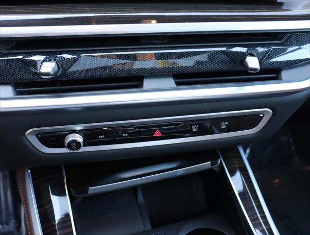 Photo of 2024 Mineral White Metallic BMW X5 PHEV