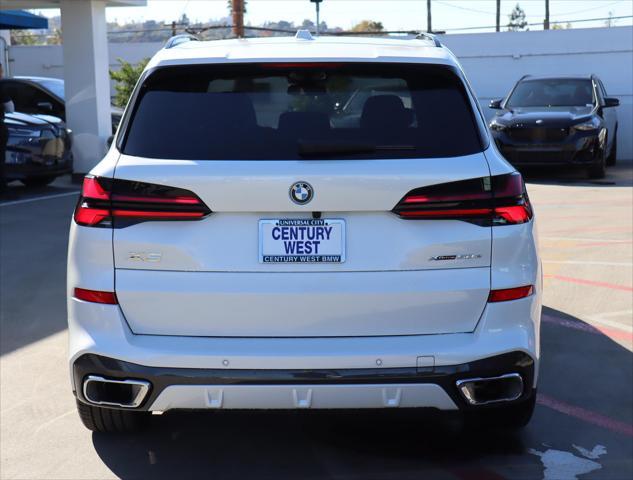 Photo of 2024 Mineral White Metallic BMW X5 PHEV