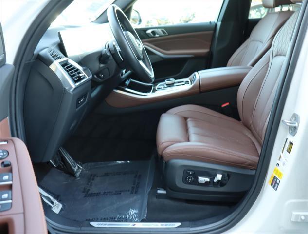 Photo of 2024 Mineral White Metallic BMW X5 PHEV