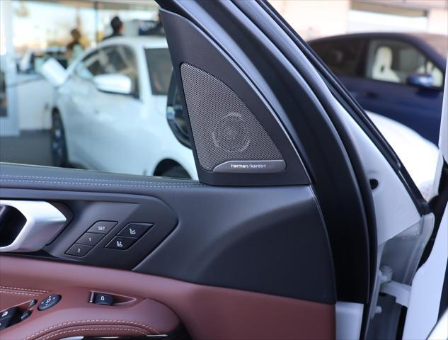 Photo of 2024 Mineral White Metallic BMW X5 PHEV