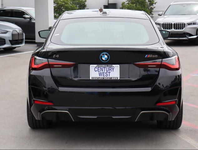 Photo of 2024 Black Sapphire Metallic BMW i4 Gran Coupe