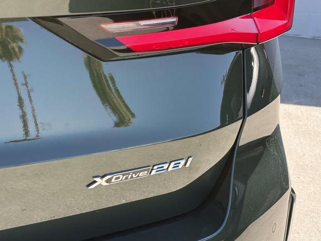 Photo of 2025 San Remo Green Metallic BMW X1