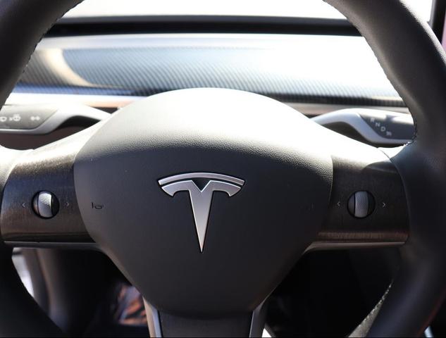 Photo of 2021 Pearl White Multi-Coat Tesla Model Y