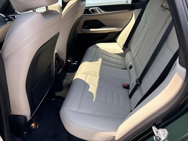 Photo of 2022 San Remo Green Metallic BMW i4 Gran Coupe