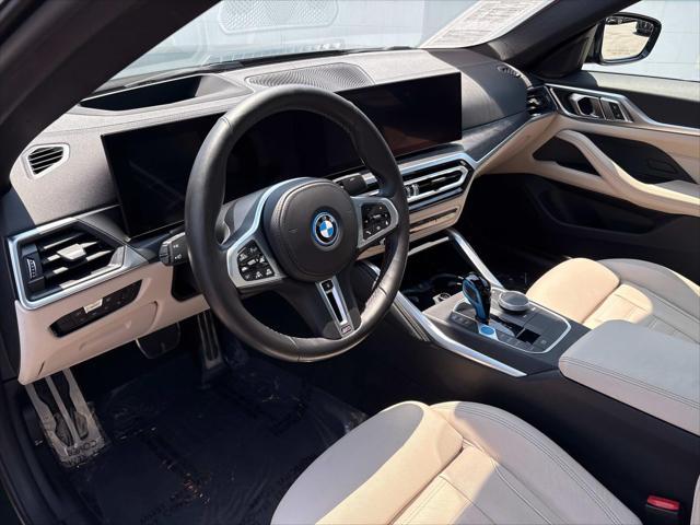Photo of 2022 San Remo Green Metallic BMW i4 Gran Coupe