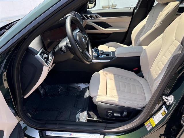 Photo of 2022 San Remo Green Metallic BMW i4 Gran Coupe
