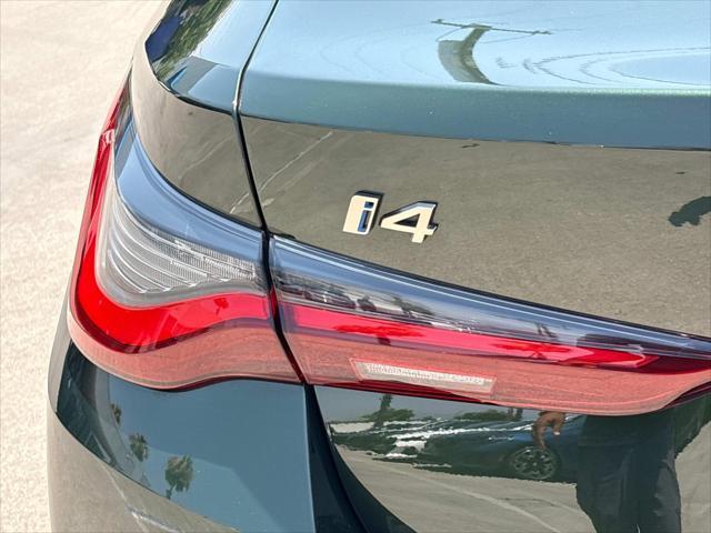 Photo of 2022 San Remo Green Metallic BMW i4 Gran Coupe