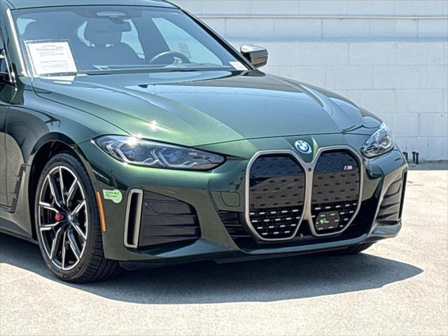 Photo of 2022 San Remo Green Metallic BMW i4 Gran Coupe