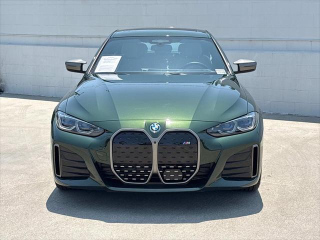 Photo of 2022 San Remo Green Metallic BMW i4 Gran Coupe