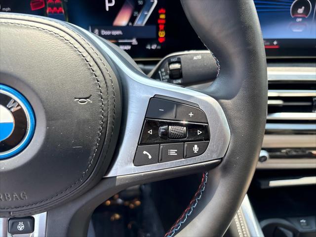 Photo of 2022 San Remo Green Metallic BMW i4 Gran Coupe