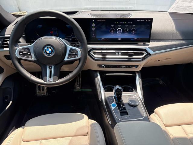 Photo of 2022 San Remo Green Metallic BMW i4 Gran Coupe
