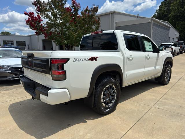 Photo of 2025 Glacier White Nissan Frontier