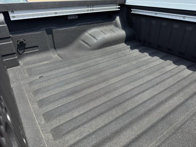 Photo of 2025 Glacier White Nissan Frontier