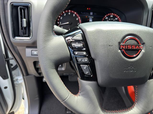 Photo of 2025 Glacier White Nissan Frontier
