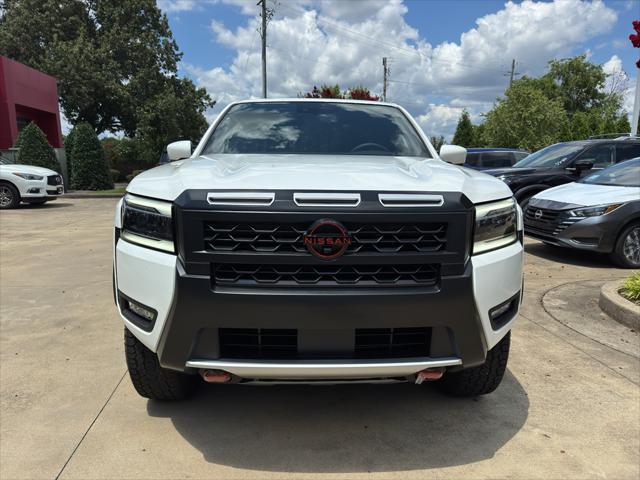 Photo of 2025 Glacier White Nissan Frontier
