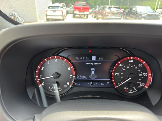 Photo of 2025 Glacier White Nissan Frontier