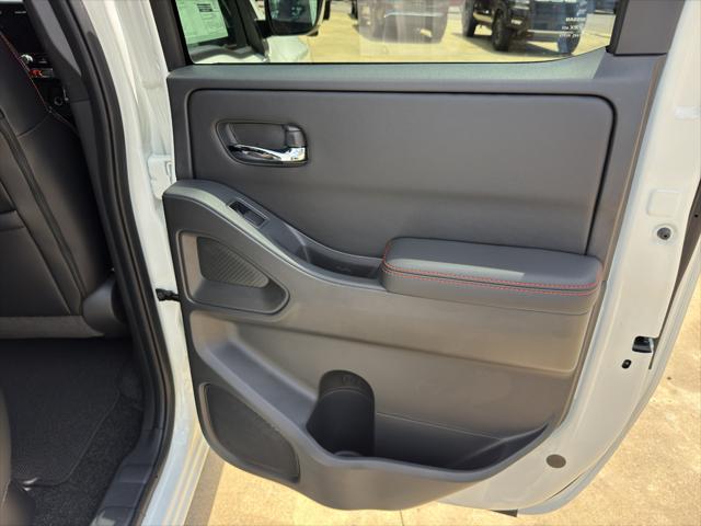 Photo of 2025 Glacier White Nissan Frontier