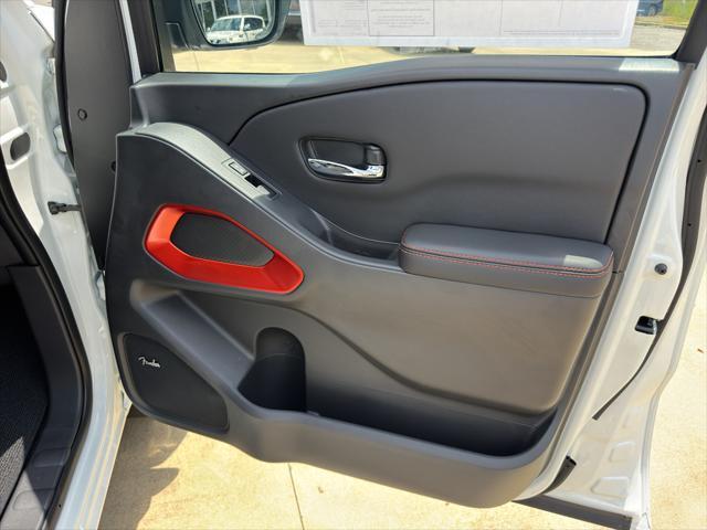 Photo of 2025 Glacier White Nissan Frontier