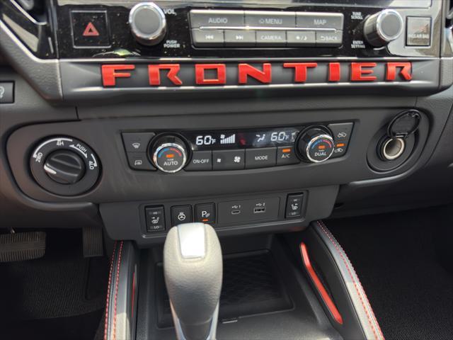 Photo of 2025 Glacier White Nissan Frontier