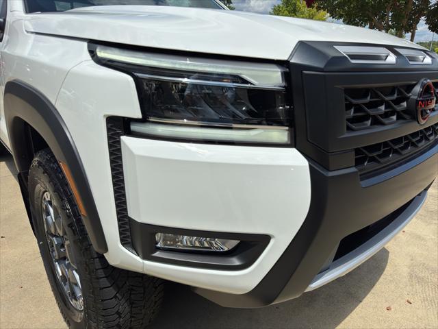 Photo of 2025 Glacier White Nissan Frontier