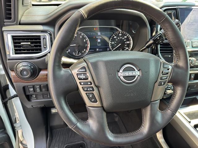 Photo of 2024 Pearl White Tricoat Nissan Titan