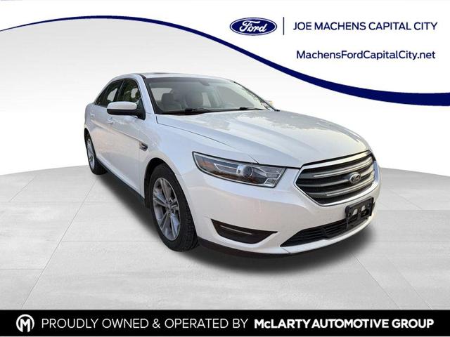 Photo of 2016 WHITE PLATINUM MET TRI-COAT Ford Taurus