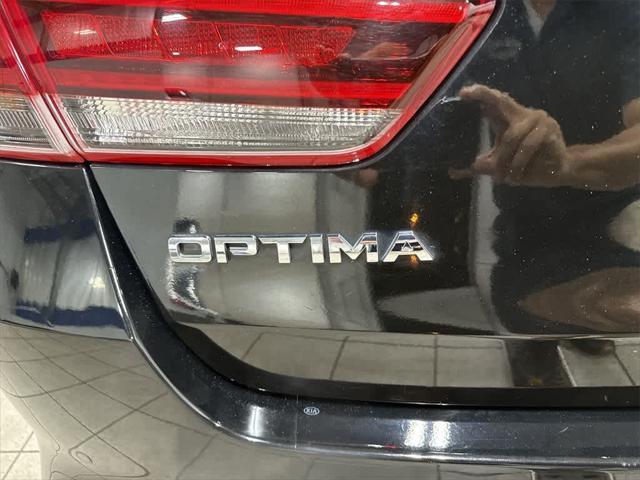 Photo of 2018 Ebony Black Kia Optima