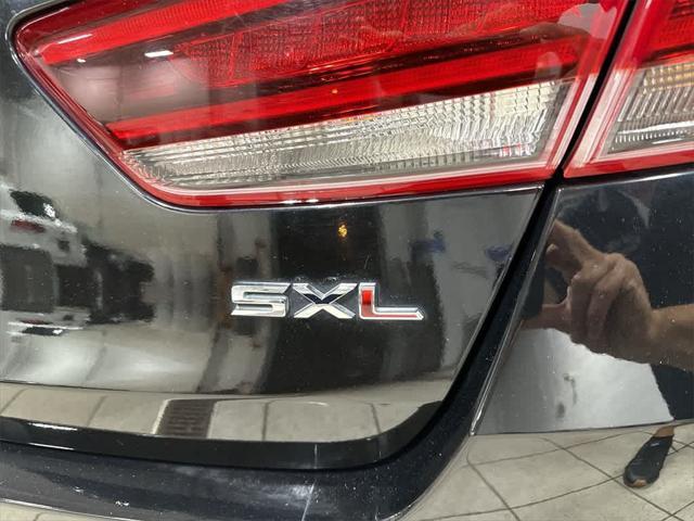 Photo of 2018 Ebony Black Kia Optima