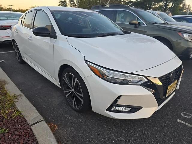 Photo of 2023 Aspen White Tricoat Nissan Sentra