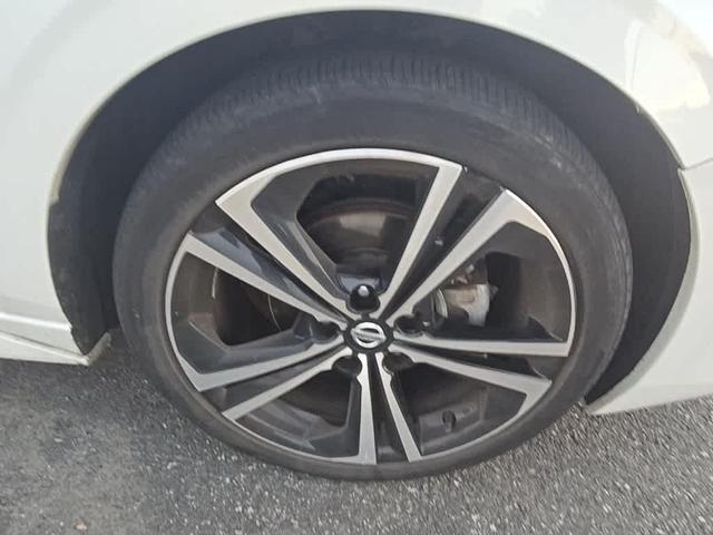Photo of 2023 Aspen White Tricoat Nissan Sentra