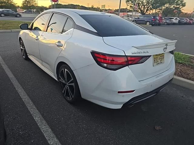 Photo of 2023 Aspen White Tricoat Nissan Sentra