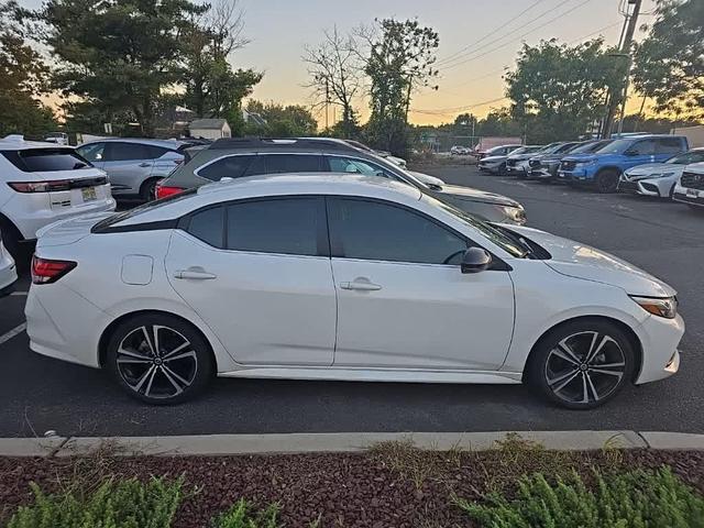 Photo of 2023 Aspen White Tricoat Nissan Sentra