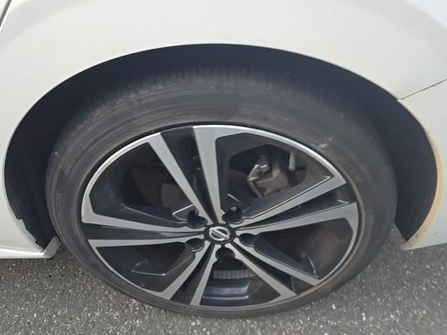 Photo of 2023 Aspen White Tricoat Nissan Sentra