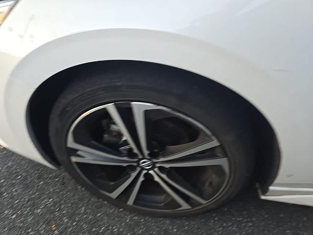 Photo of 2023 Aspen White Tricoat Nissan Sentra
