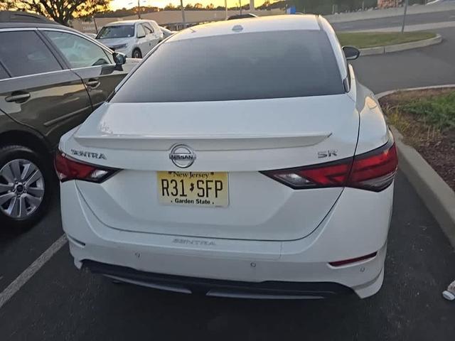 Photo of 2023 Aspen White Tricoat Nissan Sentra