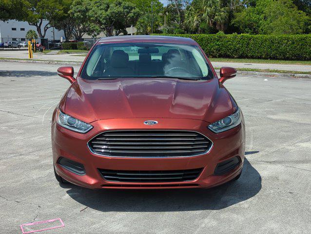 Photo of 2014 Sunset Metallic Ford Fusion