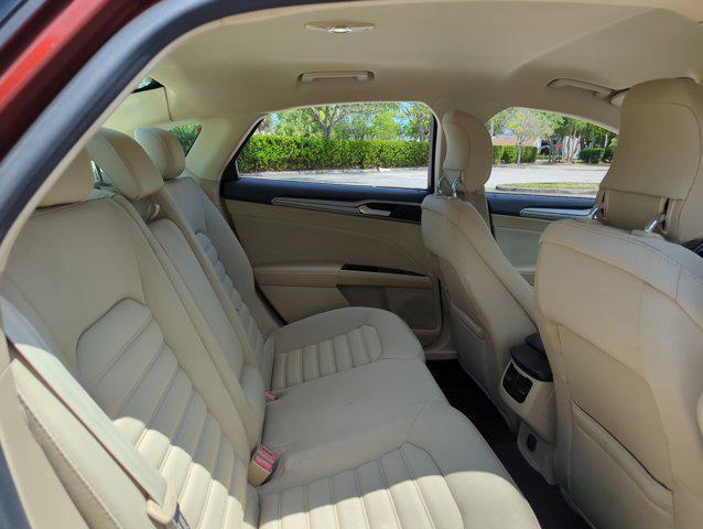 Photo of 2014 Sunset Metallic Ford Fusion